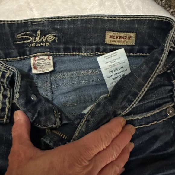 Silver denim slim bootcut jeans.  Embroidered, buttoned back pockets.  Size 24 - Picture 6 of 11
